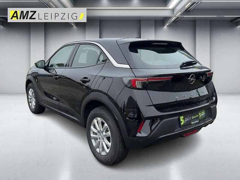 Gebraucht Opel Mokka Enjoy 101 PS (74 kW) 2023 Lackierung schwarz perla nera/ SUV