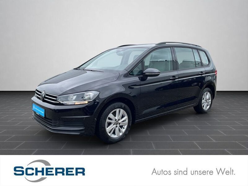 Deep black perleffekt (metallic) Gebraucht 2024 VW Touran Comfortline Van / Kleinbus | 32.450 € (Fairer Preis) - Bild 1/4