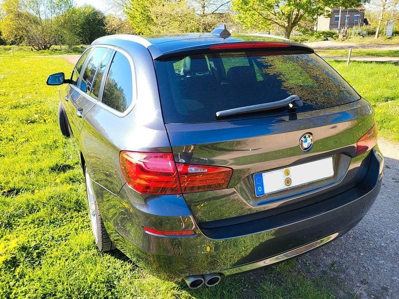Second-hand BMW 520 184 CP (135 kW) 2014 Negru Berlinǎ
