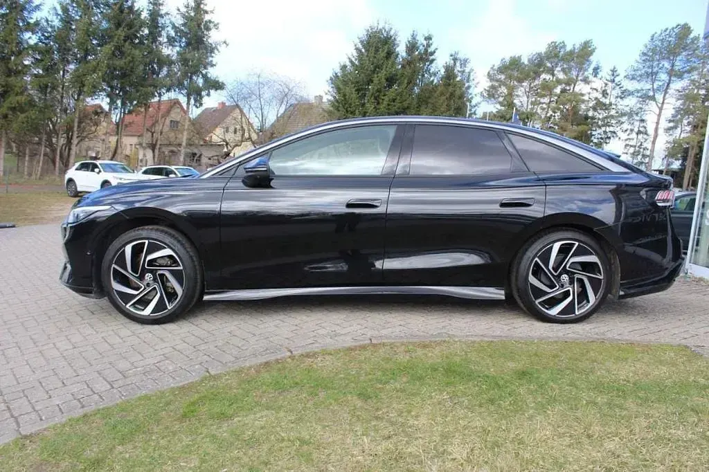Gebraucht VW ID.7 Pro 210 kW (286 PS) 2023 Grenadillschwarz (metallic) Kleinwagen