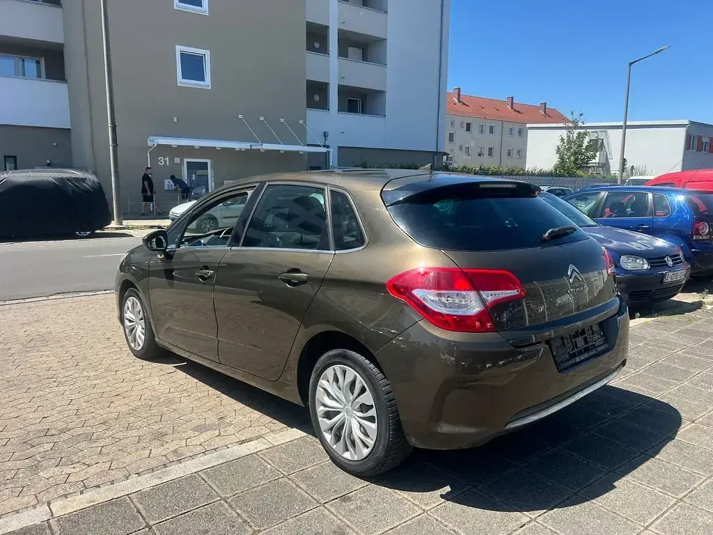 Gebraucht Citroën C4 120 PS (88 kW) 2012 Braun Limousine