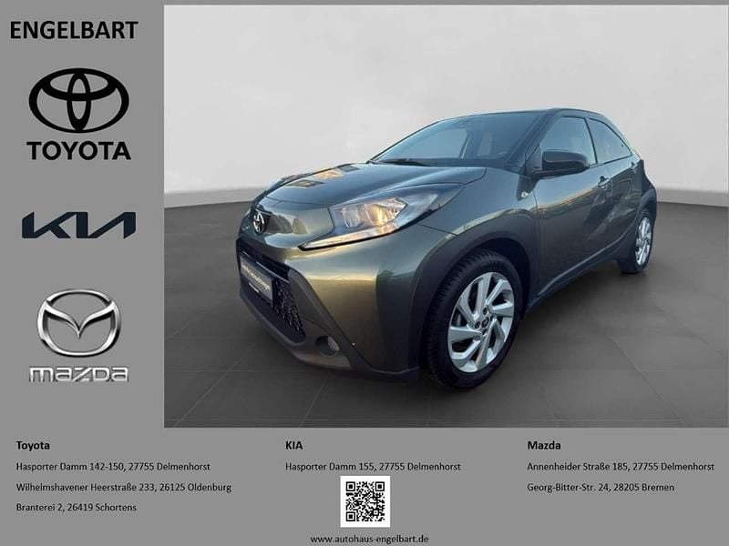 Dunkelgruen Gebraucht 2022 Toyota Aygo X Pulse SUV | 14.450 € (Fairer Preis) - Bild 1/4