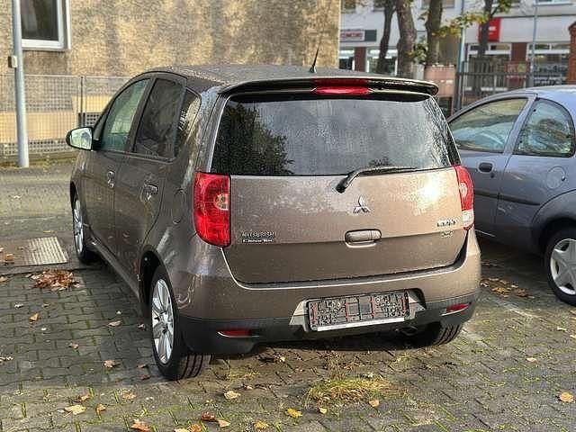 Gebraucht Mitsubishi Colt 75 PS (55 kW) 2013 Braun Limousine