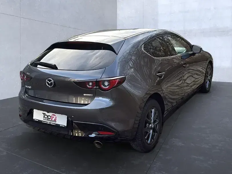 Gebraucht Mazda 3 Exclusive-Line 186 PS (136 kW) 2023 Machine grey (metallic) Limousine