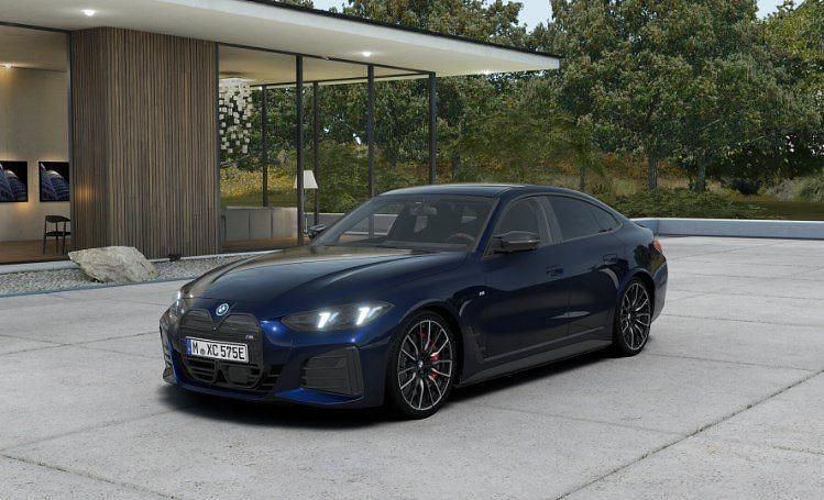 Tansanitblau ii metallic (metallic) Gebraucht 2024 BMW i4 Performance Limousine | 65.790 € - Bild 1/4