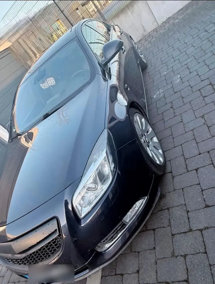 Używany Opel Insignia 200 KM (147 kW) 2012 Purpurowy Sedan/Limuzyna