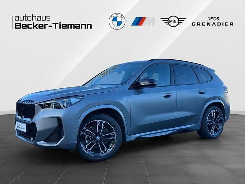 Grau Gebraucht 2022 BMW iX1 Comfort Edition SUV | 39.801 € (Fairer Preis) - Bild 1/4