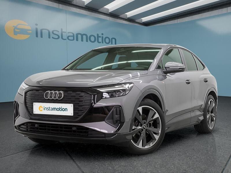 Grau Gebraucht 2022 Audi Q4 Sportback e-tron SUV | 30.099 € (Etwas zu teuer) - Bild 1/4