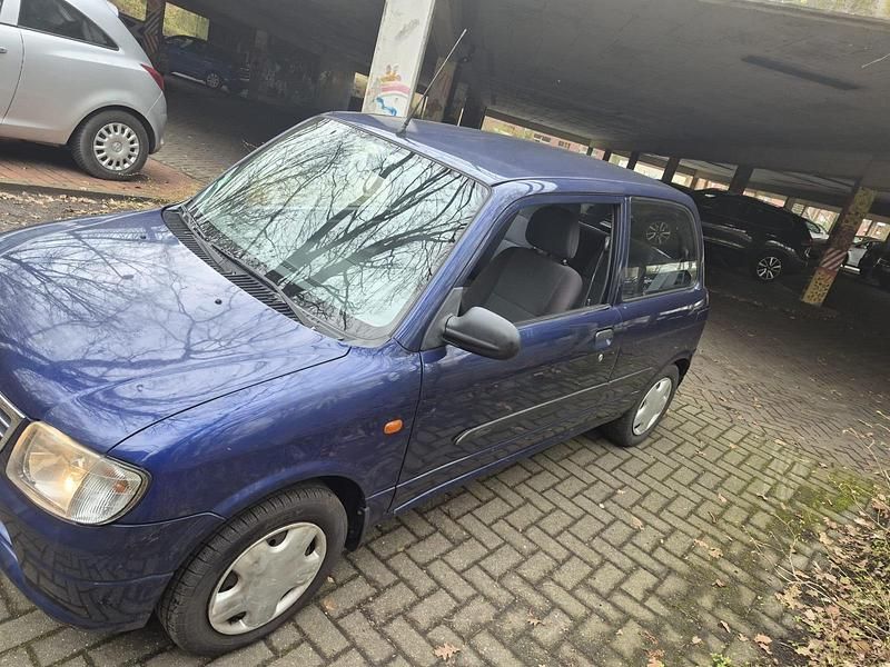Gebraucht Daihatsu Cuore 56 PS (41 kW) 2001 Blau Kleinwagen