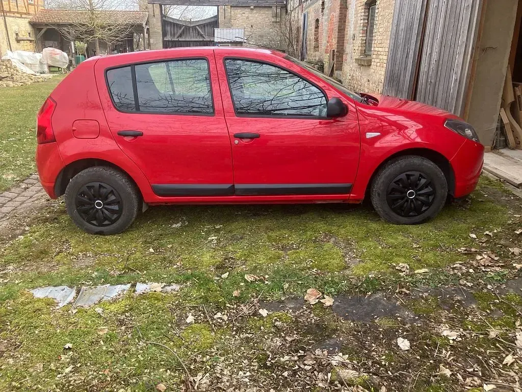 Gebraucht Dacia Sandero Ambiance 75 PS (55 kW) 2009 Rot Limousine