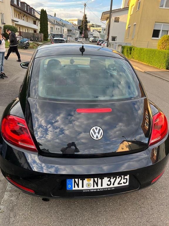Second-hand VW Beetle 105 CP (77 kW) 2013 Negru Hatchback