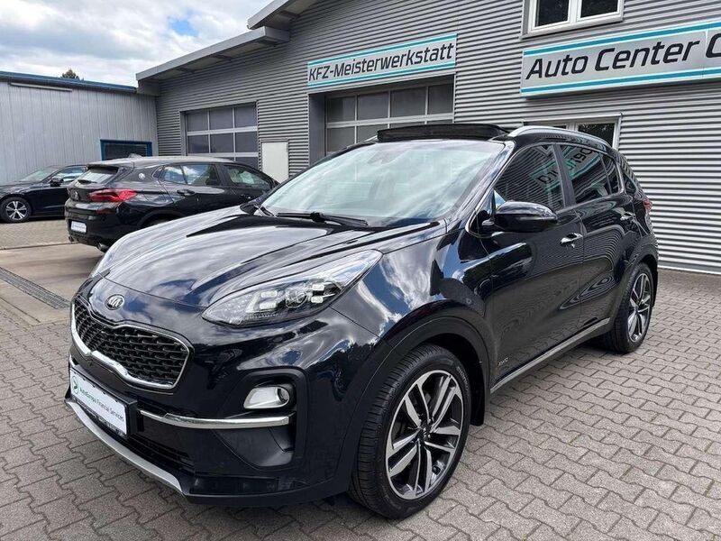 (1k) zilinaschwarz met. Gebraucht 2021 Kia Sportage Platinum Edition SUV | 21.900 € - Bild 1/4