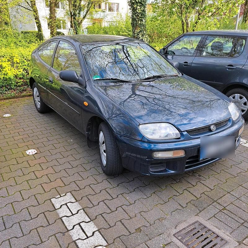 Grün Gebraucht 1996 Mazda 323C Coupé | 1.700 € - Bild 1/4