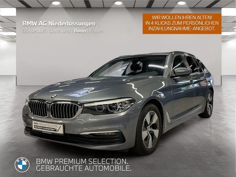 Grau Gebraucht 2019 BMW 520 Sport Line Kombi | 26.499 € (Fairer Preis) - Bild 1/4
