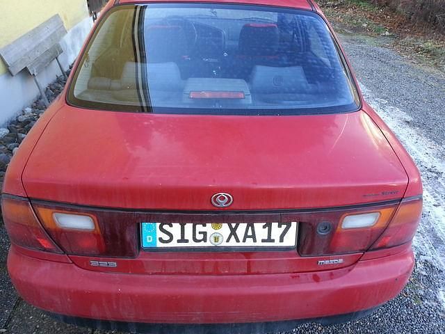 Gebraucht Mazda 323 102 PS (75 kW) 1996 Rot Limousine