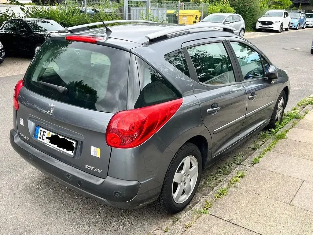 Gebraucht Peugeot 207 Premium 95 PS (69 kW) 2011 Grau Kombi