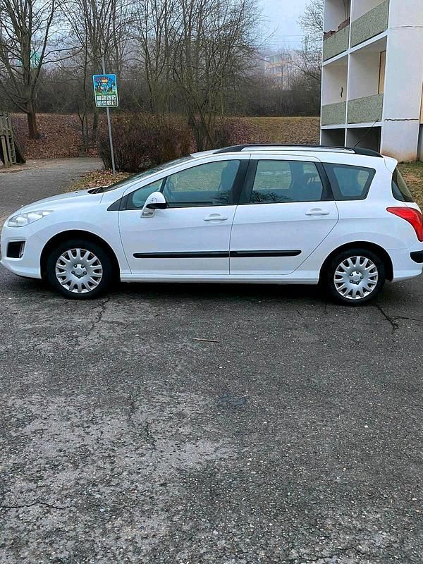 Gebraucht Peugeot 308 105 PS (77 kW) 2012 Weiß Kombi