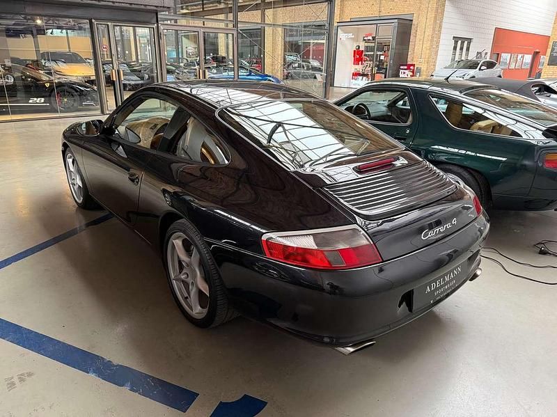 Gebraucht Porsche 911 Carrera 4 320 PS (235 kW) 2002 Schwarzmetallic Coupé