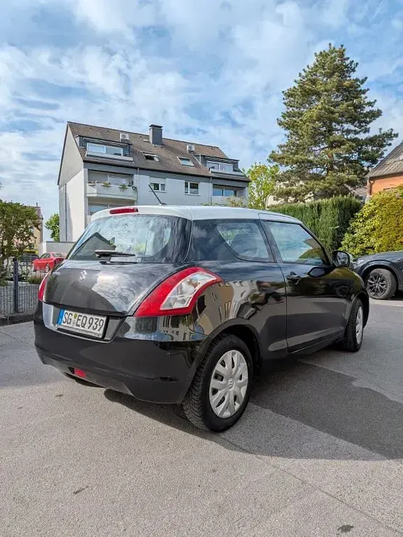 Usado Suzuki Swift 94 HP (69 kW) 2014 Preto Citadino