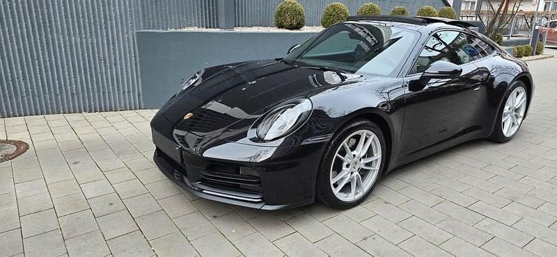 Schwarz Gebraucht 2025 Porsche 911 | 127.555 € (Guter Preis) - Bild 1/4