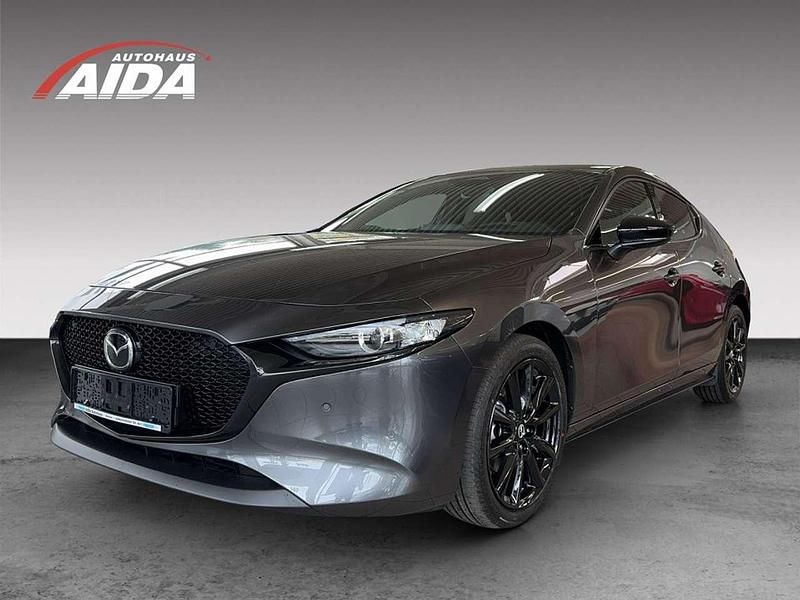 Machine gray Gebraucht 2024 Mazda 3 Homura-Line Limousine | 30.950 € (Teuer) - Bild 1/4