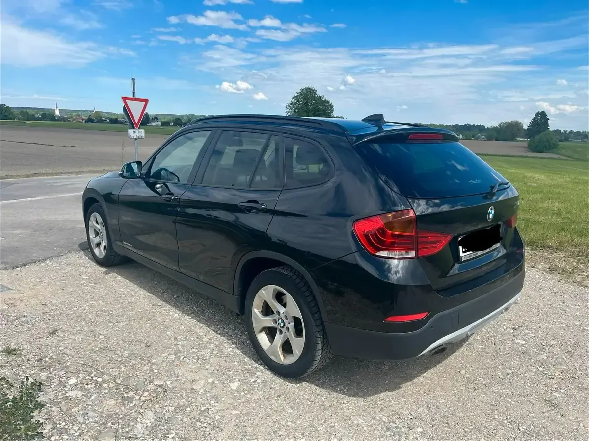 Second-hand BMW X1 143 CP (105 kW) 2014 Negru SUV