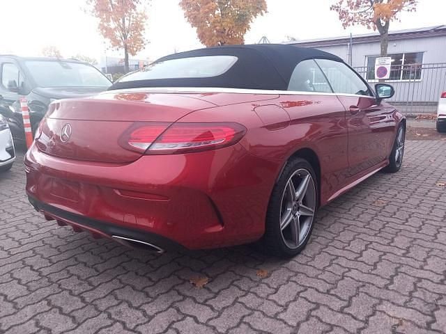 Hyazinthrot metallic hyazinthrot metallic Gebraucht 2017 Mercedes C180 AMG line Limousine | 27.851 € - Bild 1/4