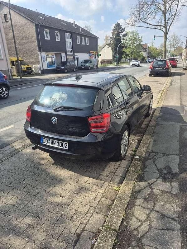 Używany BMW 116 116 KM (85 kW) 2011 Czarny Hatchback