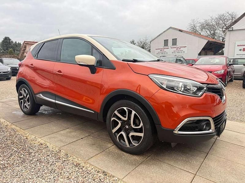 Orange enz + elfenbeinfarben d Gebraucht 2014 Renault Captur Luxe SUV | 11.999 € (Fairer Preis) - Bild 1/4