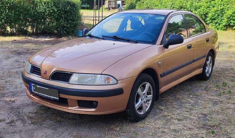 Orange Gebraucht 1999 Mitsubishi Carisma Kleinwagen | 2.400 € (Fairer Preis) - Bild 1/4