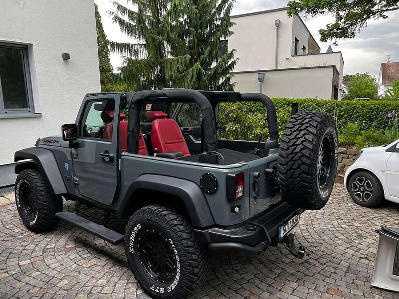Grau Gebraucht 2014 Jeep Wrangler SUV | 45.000 € - Bild 1/4