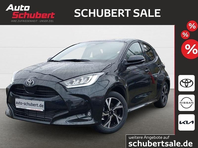 Black mica / ink Gebraucht 2024 Toyota Yaris Hybrid Team Kleinwagen | 23.850 € (Fairer Preis) - Bild 1/4