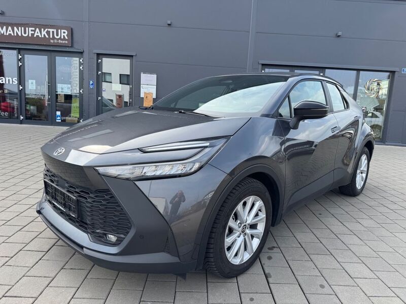 Grau Gebraucht 2024 Toyota C-HR Business Edition SUV | 27.700 € (Fairer Preis) - Bild 1/4