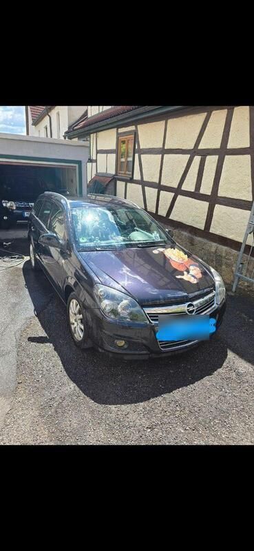 Schwarz Gebraucht 2010 Opel Astra Innovation Kombi | 1.400 € - Bild 1/4
