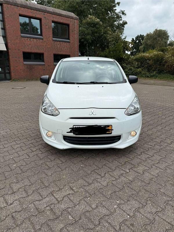 Weiß Gebraucht 2013 Mitsubishi Space Star Kleinwagen | 4.200 € (Fairer Preis) - Bild 1/4