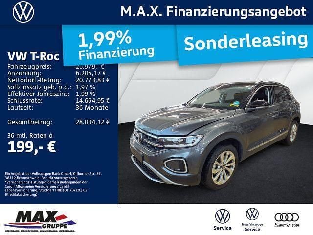 Indiumgrau metallic Gebraucht 2024 VW T-Roc Style SUV | 26.979 € (Guter Preis) - Bild 1/3
