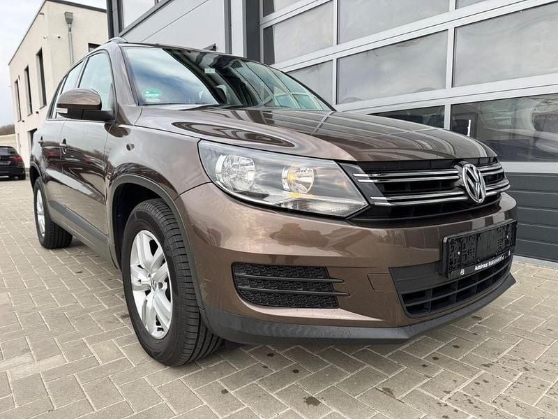 Braun Gebraucht 2014 VW Tiguan Trendline SUV | 7.990 € (Superpreis) - Bild 1/4