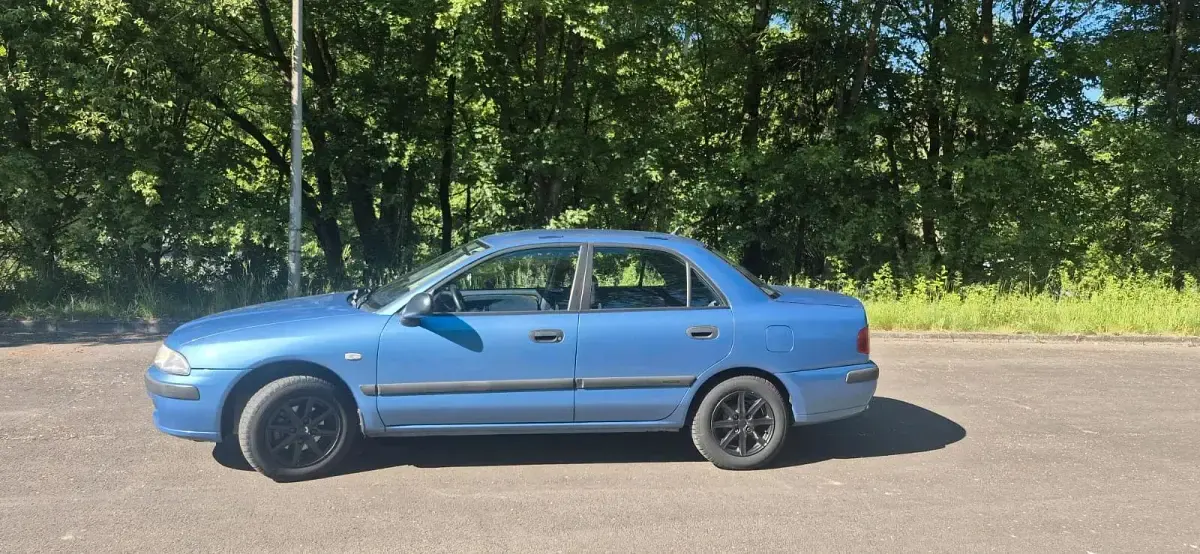 Gebraucht Mitsubishi Carisma 99 PS (72 kW) 1999 Blau Limousine
