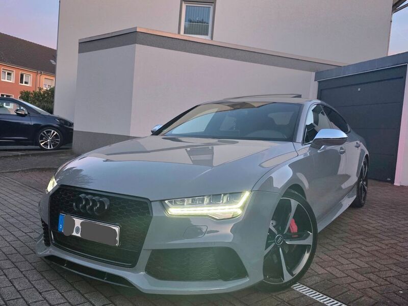Grau Gebraucht 2015 Audi RS7 Sportback Ambiente Kleinwagen | 35.999 € (Fairer Preis) - Bild 1/4