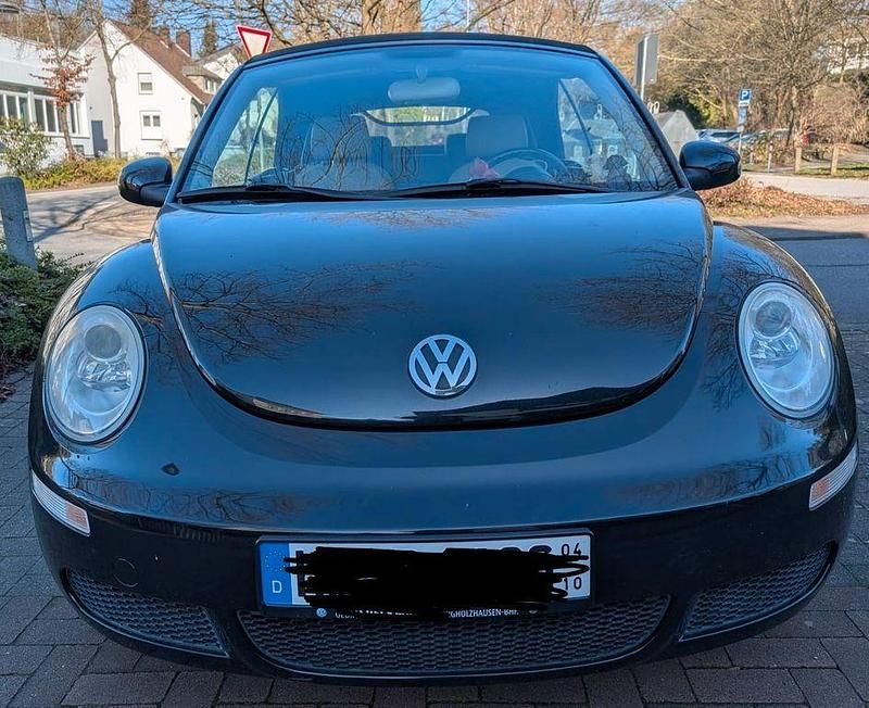 Gebraucht VW New Beetle 102 PS (75 kW) 2010 Schwarz Kleinwagen