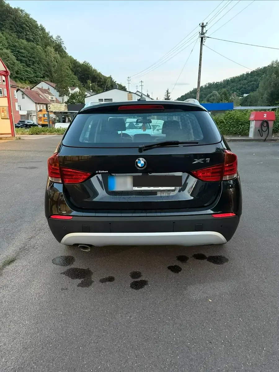 Gebraucht BMW X1 176 PS (129 kW) 2011 Schwarz SUV