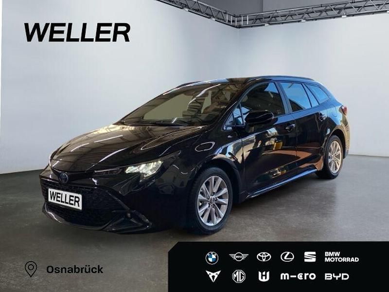 Mysticschwarz mica Gebraucht 2025 Toyota Corolla Business Edition Kombi | 26.490 € (Guter Preis) - Bild 1/3
