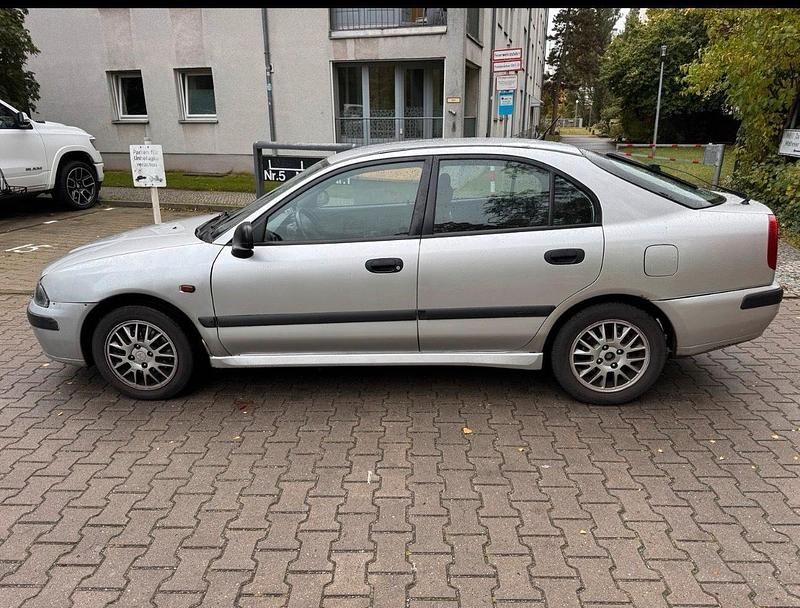 Gebraucht Mitsubishi Carisma 106 PS (77 kW) 2003 Grau Limousine