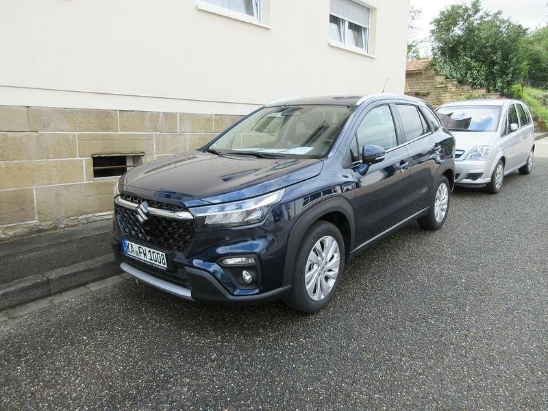 Blau Gebraucht 2024 Suzuki SX4 S-Cross Comfort SUV | 26.990 € (Fairer Preis) - Bild 1/4