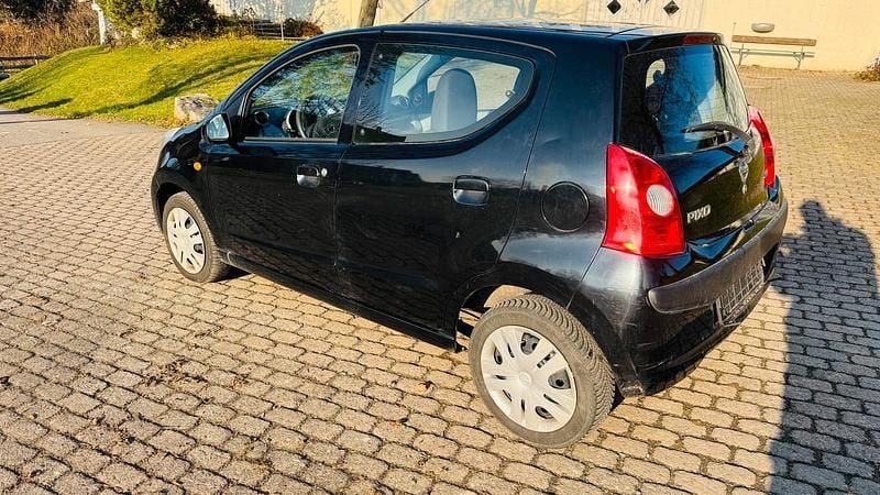 Gebraucht Nissan Pixo 65 PS (47 kW) 2011 Schwarz Kleinwagen
