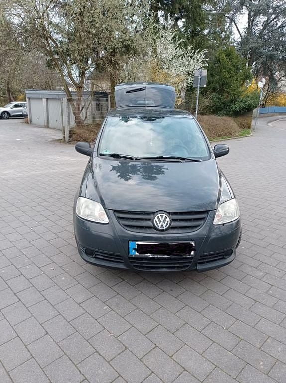 Gebraucht VW Fox 54 PS (39 kW) 2010 Schwarz Kleinwagen