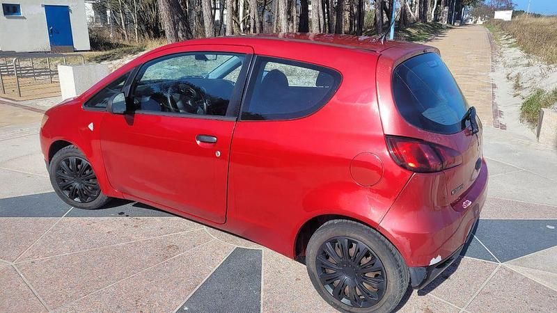 Gebraucht Mitsubishi Colt 75 PS (55 kW) 2010 Rot Kleinwagen