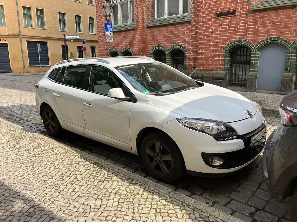 Używany Renault Mégane Initiale Paris 101 KM (74 kW) 2013 Biały Sedan/Limuzyna