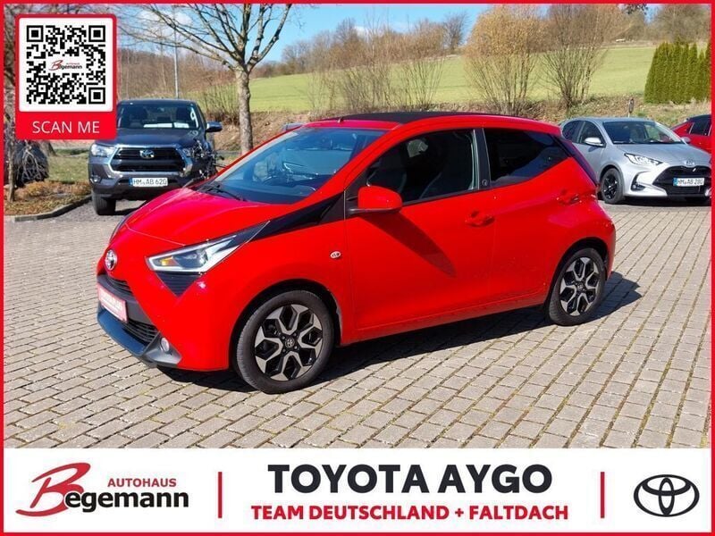 Vulcanorot Gebraucht 2021 Toyota Aygo Team Kleinwagen | 12.490 € (Etwas zu teuer) - Bild 1/4
