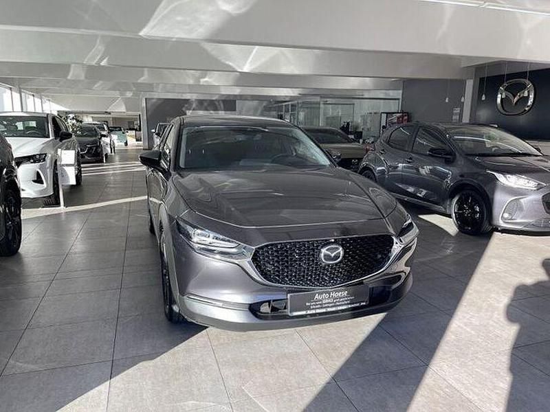 Grau Gebraucht 2022 Mazda CX-30 Selection SUV | 26.990 € (Etwas zu teuer) - Bild 1/4